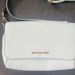 Michael Kors white cross body handbag with flap closure
